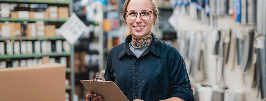 merchandiser checking products availibility for car repair